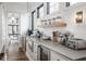 Kitchen counter and storage space filled with appliances, storage jars and natural lighting at 11003 Holliday Farms Blvd, Zionsville, IN 46077