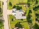 Top-down view of the house showing backyard, outdoor living space, and greenery at 11229 Echo Ridge Ln, Indianapolis, IN 46236
