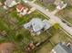 An aerial perspective of a home showcasing its spacious backyard with a hot tub and inviting deck at 11229 Echo Ridge Ln, Indianapolis, IN 46236