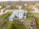An aerial shot of a home with a large backyard, deck, hot tub, and patio area at 11229 Echo Ridge Ln, Indianapolis, IN 46236