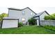 View of the backyard, siding, yard, and shed at 11229 Echo Ridge Ln, Indianapolis, IN 46236