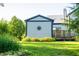 Exterior view of the backyard of the property with a lush lawn at 11229 Echo Ridge Ln, Indianapolis, IN 46236