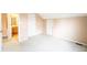 A spacious bedroom with carpeted floors and neutral walls, and an ensuite bathroom at 11229 Echo Ridge Ln, Indianapolis, IN 46236