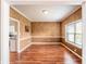 Formal dining room with wood floors, a window, and neutral paint, perfect for gatherings at 11229 Echo Ridge Ln, Indianapolis, IN 46236