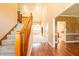 Bright entryway featuring hardwood floors, staircase and open floor plan at 11229 Echo Ridge Ln, Indianapolis, IN 46236