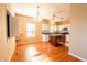 Well-lit kitchen features a wooden island, white cabinets, and stainless appliances at 11229 Echo Ridge Ln, Indianapolis, IN 46236
