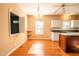 Eat-in kitchen features a wooden island, white cabinets, and stainless appliances at 11229 Echo Ridge Ln, Indianapolis, IN 46236