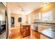 Well-lit kitchen features modern stainless appliances and wooden center island at 11229 Echo Ridge Ln, Indianapolis, IN 46236