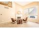 Cozy living room showcasing a fireplace, natural light, and comfortable seating at 11229 Echo Ridge Ln, Indianapolis, IN 46236