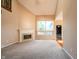 Spacious living room featuring a fireplace and large window at 11229 Echo Ridge Ln, Indianapolis, IN 46236