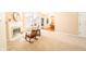 Bright living room with fireplace, seating area, and a glimpse of the adjacent dining area at 11229 Echo Ridge Ln, Indianapolis, IN 46236