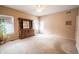 Bright, carpeted primary bedroom with large dresser and ample space at 11229 Echo Ridge Ln, Indianapolis, IN 46236