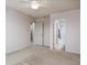 Bright bedroom with a ceiling fan and an attached bathroom with a shower at 11475 Clay Ct # 102, Fishers, IN 46037