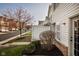 Well maintained townhome with lush landscaping and a welcoming entrance at 11475 Clay Ct # 102, Fishers, IN 46037
