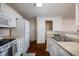 Modern kitchen featuring a large refrigerator, microwave, and range at 11475 Clay Ct # 102, Fishers, IN 46037