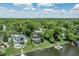 Aerial view of the property featuring a pool and a private dock at 11941 Sand Dollar Cir, Indianapolis, IN 46256