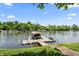Private boat dock on a serene lake setting at 11941 Sand Dollar Cir, Indianapolis, IN 46256