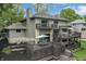 View of the back of the house with its multi-level decks and stunning backyard at 11941 Sand Dollar Cir, Indianapolis, IN 46256