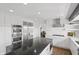Bright kitchen with white cabinets, stainless steel appliances, and a view to the dining room at 11941 Sand Dollar Cir, Indianapolis, IN 46256