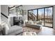 Spacious living room featuring a piano, cozy seating, and sliding glass doors to the deck at 11941 Sand Dollar Cir, Indianapolis, IN 46256