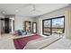 Spacious main bedroom featuring a private balcony and a cozy reading nook with natural light at 11941 Sand Dollar Cir, Indianapolis, IN 46256