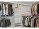 A well-organized walk-in closet with ample storage, shelving, and hanging space at 11941 Sand Dollar Cir, Indianapolis, IN 46256