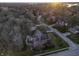 Aerial view of the property, highlighting the backyard entertaining space and manicured landscaping at 12065 Watermark Ct, Indianapolis, IN 46236