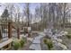 Wonderful backyard featuring a deck, hot tub, and fire pit area for outdoor enjoyment and relaxation at 12065 Watermark Ct, Indianapolis, IN 46236
