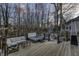 Inviting backyard features a hot tub, lounge seating, fire pit and string lighting creating an ideal entertaining space at 12065 Watermark Ct, Indianapolis, IN 46236