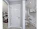 This bathroom features a shower-tub combination and lots of storage at 12065 Watermark Ct, Indianapolis, IN 46236
