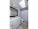 Bathroom featuring a marble countertop, modern vanity, and shower-tub combination at 12065 Watermark Ct, Indianapolis, IN 46236