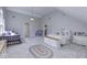 Spacious bedroom with high ceilings, carpeted floors, and neutral colors at 12065 Watermark Ct, Indianapolis, IN 46236