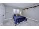 This bedroom offers a calming color palette with lots of light and space at 12065 Watermark Ct, Indianapolis, IN 46236