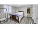 Basement bedroom with natural light, neutral colors, and a bonus hanging chair at 12065 Watermark Ct, Indianapolis, IN 46236