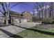 Brick home featuring an attached garage with a basketball hoop on a spacious driveway at 12065 Watermark Ct, Indianapolis, IN 46236