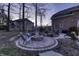 Relaxing backyard fire pit area with stylish seating creating the ideal outdoor space for gathering with friends at 12065 Watermark Ct, Indianapolis, IN 46236