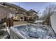 Backyard deck featuring a modern hot tub and comfortable outdoor seating area at 12065 Watermark Ct, Indianapolis, IN 46236
