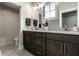 Modern bathroom with double vanity, stylish fixtures, and a clean, well-lit space at 12099 Sigillary Way, Carmel, IN 46032