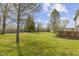 Large back yard with a storage shed and a deck, great for outdoor entertaining at 12161 Pebblebrooke Ct, Indianapolis, IN 46236