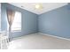 Bedroom featuring a ceiling fan and light-toned carpet at 12161 Pebblebrooke Ct, Indianapolis, IN 46236