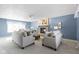 Bright living room featuring a stone fireplace, comfortable seating, and neutral decor at 12161 Pebblebrooke Ct, Indianapolis, IN 46236