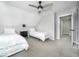 Bedroom featuring ceiling fan, carpet, and two twin beds with a night stand at 1444 English Ave, Indianapolis, IN 46201