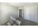 Cozy bedroom includes closet and adjacent doorway, carpeted floor at 14466 Chapelwood Ln, Fishers, IN 46037