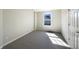 Well-lit bedroom featuring neutral walls and carpeted floor at 14466 Chapelwood Ln, Fishers, IN 46037