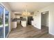 Modern kitchen with an island, stainless steel appliances, and lots of cabinet space at 14466 Chapelwood Ln, Fishers, IN 46037