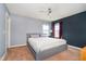 Comfortable bedroom with soft lighting, neutral decor, and a queen-size bed at 1464 Hession Dr, Brownsburg, IN 46112