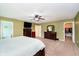Generously sized main bedroom has closet access, lots of furniture and ensuite bathroom at 1464 Hession Dr, Brownsburg, IN 46112
