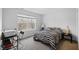 Bedroom with a window, black and white bedding, and a view of the outdoors at 14974 Dry Creek Rd, Noblesville, IN 46060