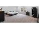 Spacious bedroom with neutral carpet, a large window, and ample closet space at 14974 Dry Creek Rd, Noblesville, IN 46060