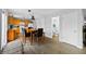 Eat-in kitchen with dining table, providing a cozy space for Gathering meals next to an adjacent half bathroom at 14974 Dry Creek Rd, Noblesville, IN 46060